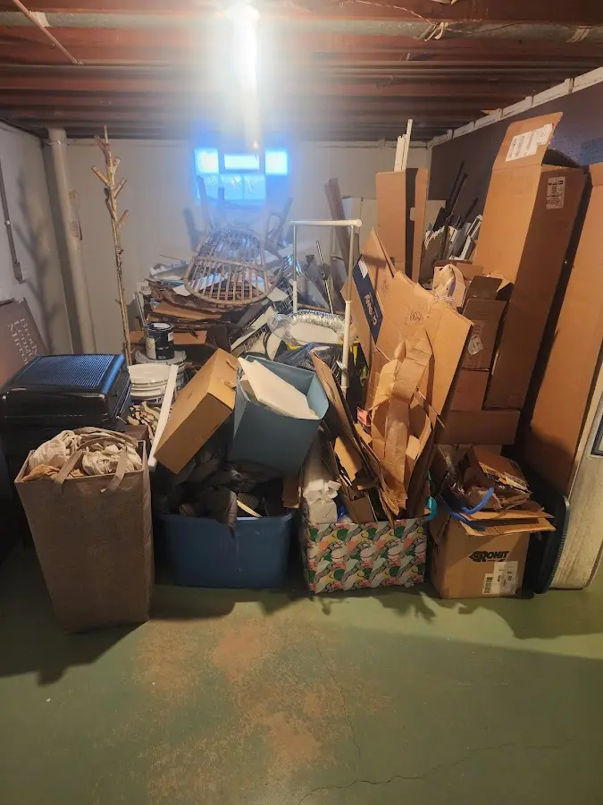 Roll-off dumpster container at job site for Yard Waste Dumpster Rental in Belfair